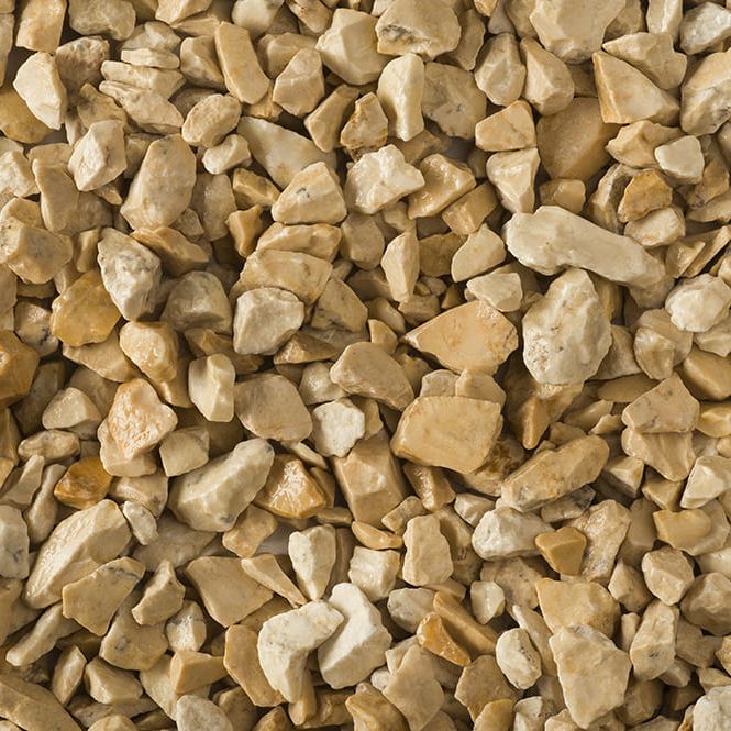 Geel en beige siergrind: close-up van gele split