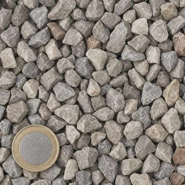 Franse Dolomiet 7/14 mm van bovenaf, op schaal naast een munt van 1 euro (gezichtsveld 9 bij 9 cm)