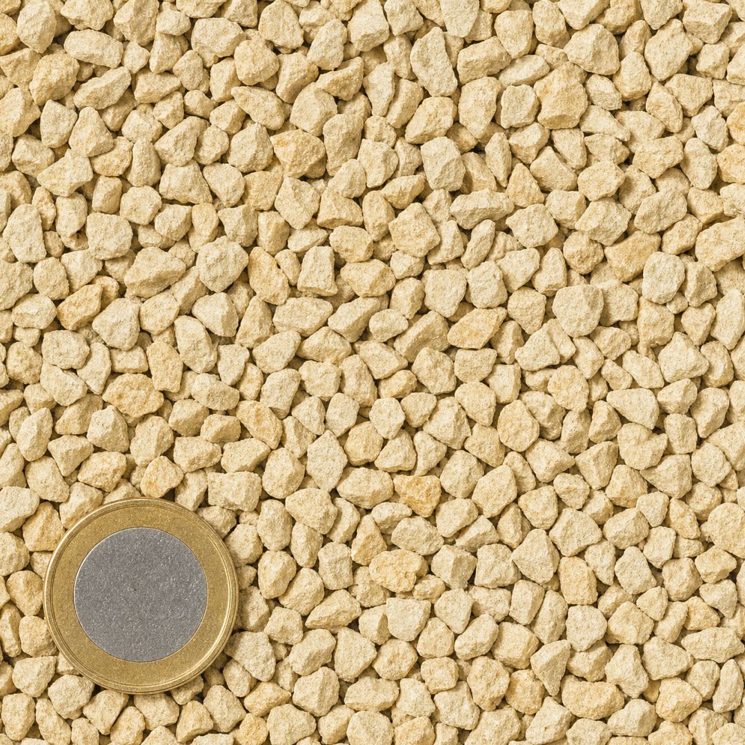 Jura 4/8 mm van bovenaf, op schaal naast een munt van 1 euro (gezichtsveld 9 bij 9 cm)