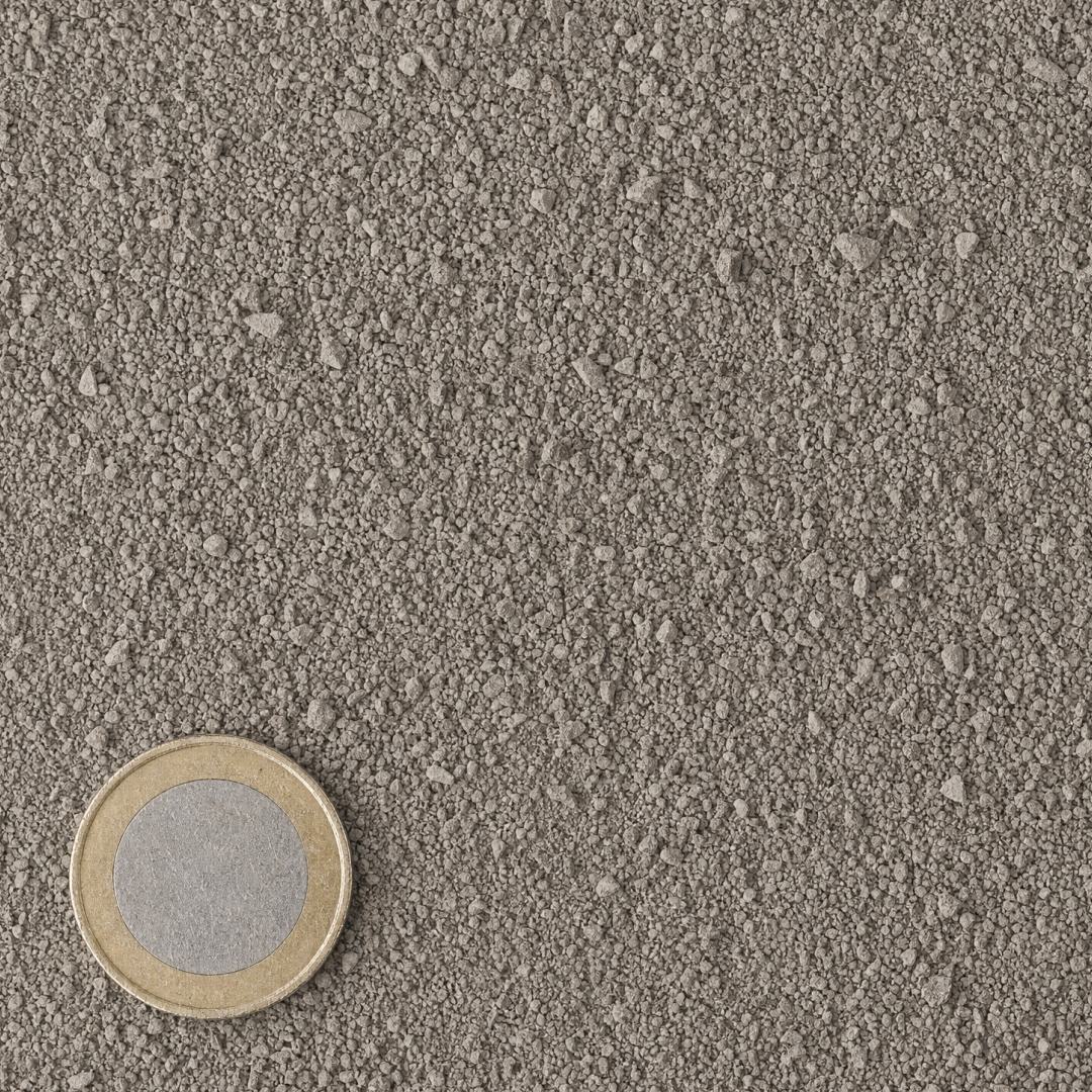Kalksteenslag 0/4 mm van bovenaf, op schaal naast een munt van 1 euro (gezichtsveld 9 bij 9 cm)
